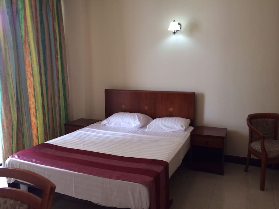 Bed Room 1: Queen Size bed, ceiling high mirrowed wardrobe, Writing Table, Sea view and city view from the bed room