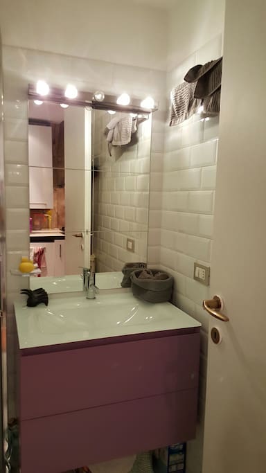 bathroom with shower on lower level