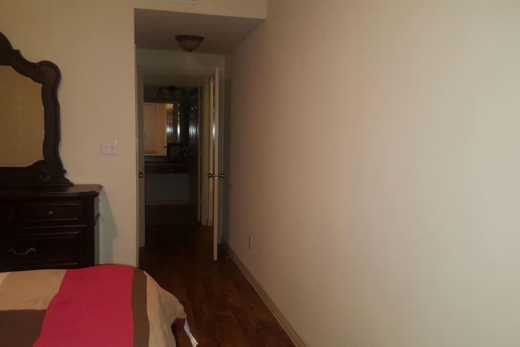 Hall leading to Closet and Private Bathroom.