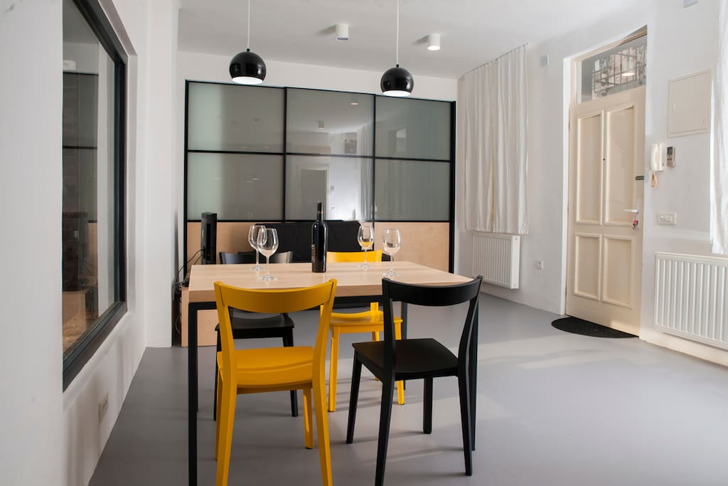 Living room and bedroom are separated by sliding doors