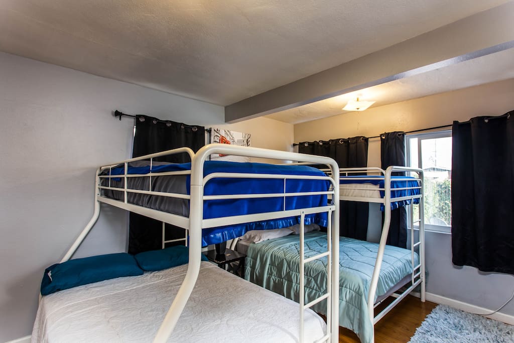 Bunk Beds: 2 Full Size Beds Below and 2 Twin Beds Above