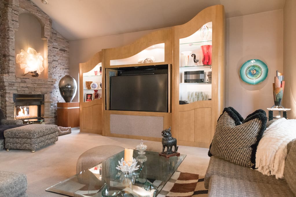 Here's our 75 inch TV and fireplace in the living room.