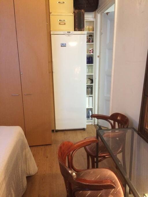 ...inside the room is own refrigerator and a cabinet right side of the ref, with ready tea, coffee, honey, sugar etc.