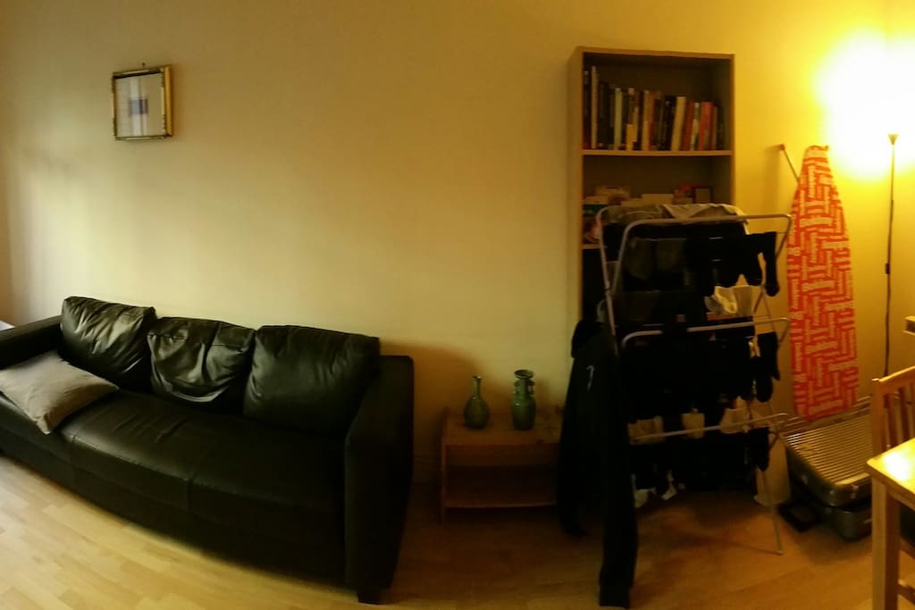 Living Room (has personal belongings ) but you can use sofa and dining table.