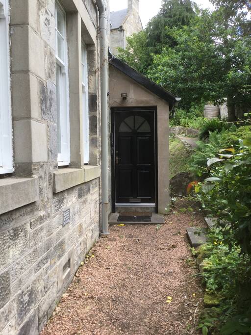 Front door leading to the apartment