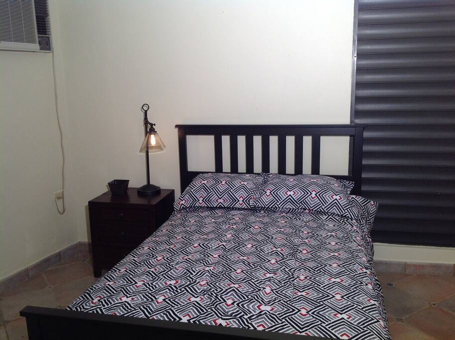 First floor bedroom has full size bed, A/C