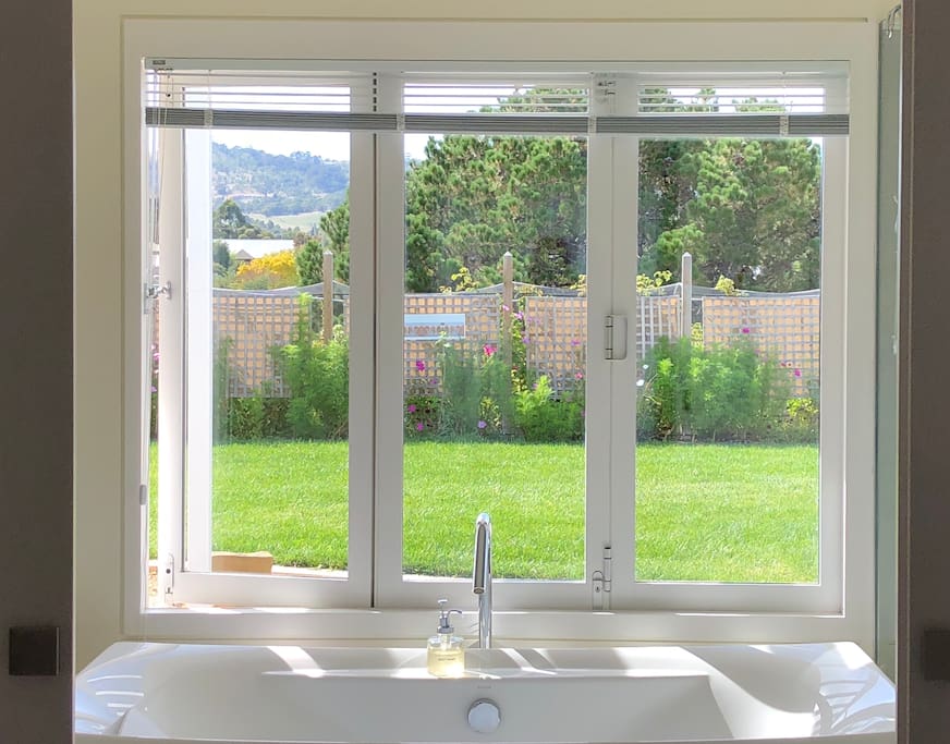 A view to the garden from the bath