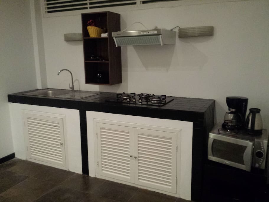 Kitchen with full kitchen ware
