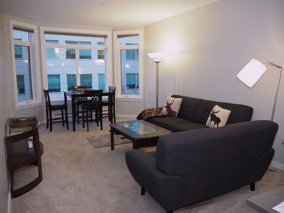 Spacious living room with new furnitures and a mini foosball coffee table!