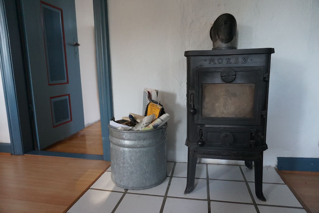 What's hygge without a fireplace? The house comes complete with firewood for your first fire - and outside there's of course also a BBQ