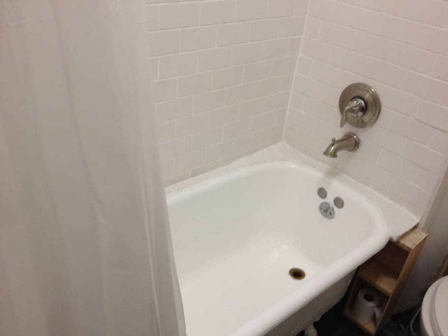 bathroom with claw foot tub