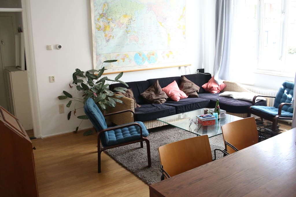 The (shared) living-room, with a big sofa for relaxing.