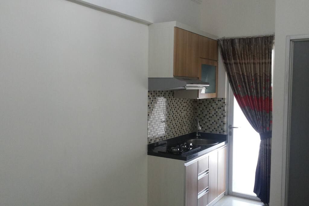 R.Keluarga + kitchen set dan gordyn pintu teras