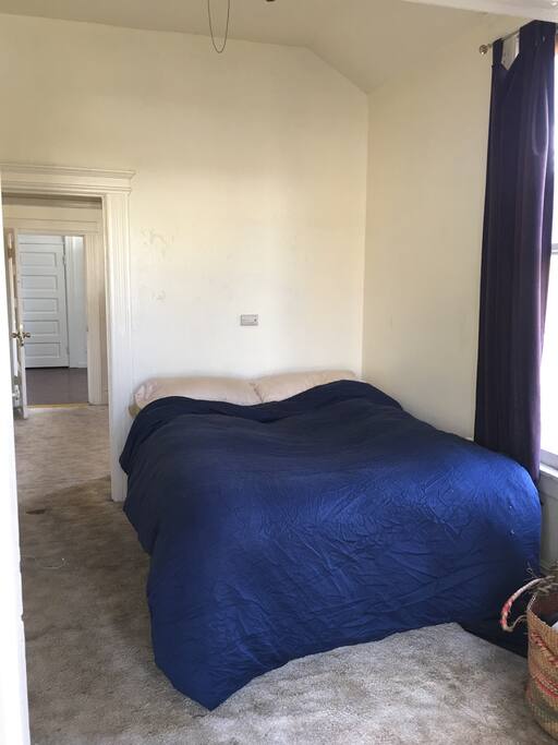 Bedroom off the main room with French doors that close when you want separation.