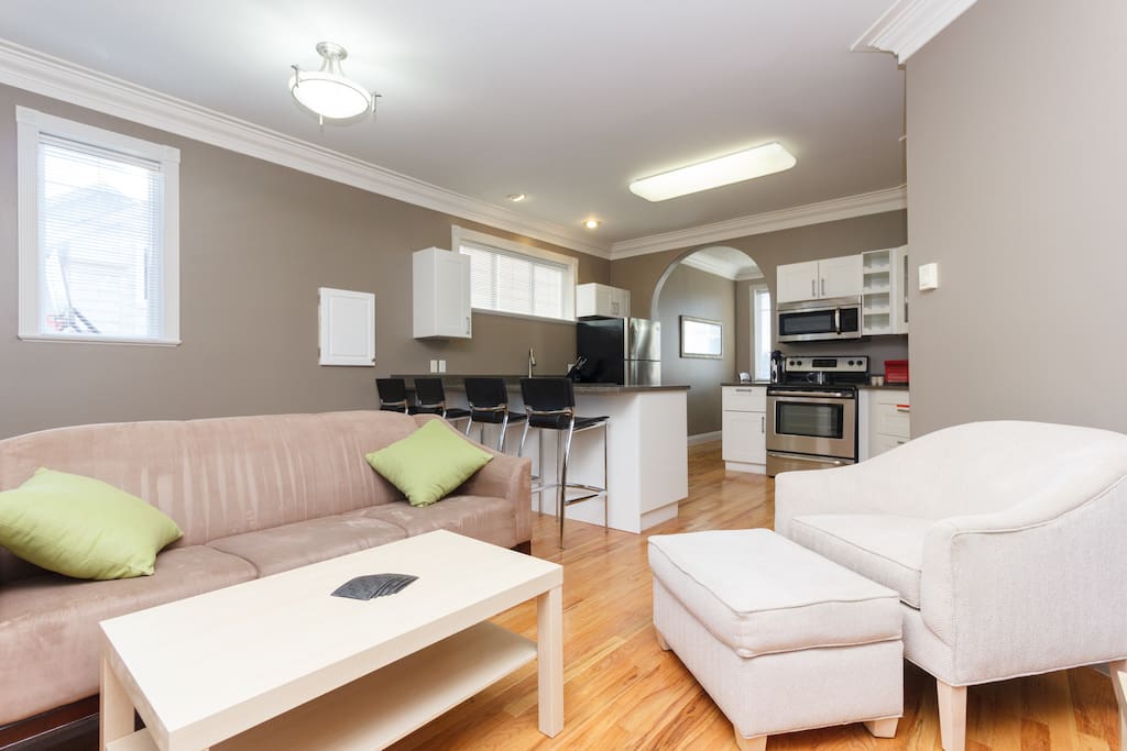 sitting area with TV off the kitchen
