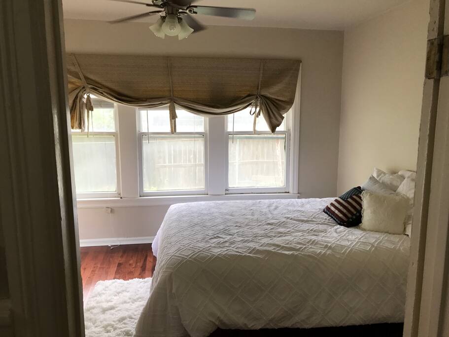 Queen Bed in Main Bedroom, full length stand up mirror not shown
