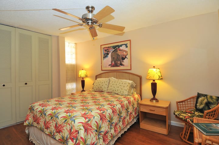 Large bedroom with  comfortable queen bed.