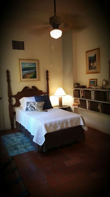 A private bedroom with windows to the courtyard