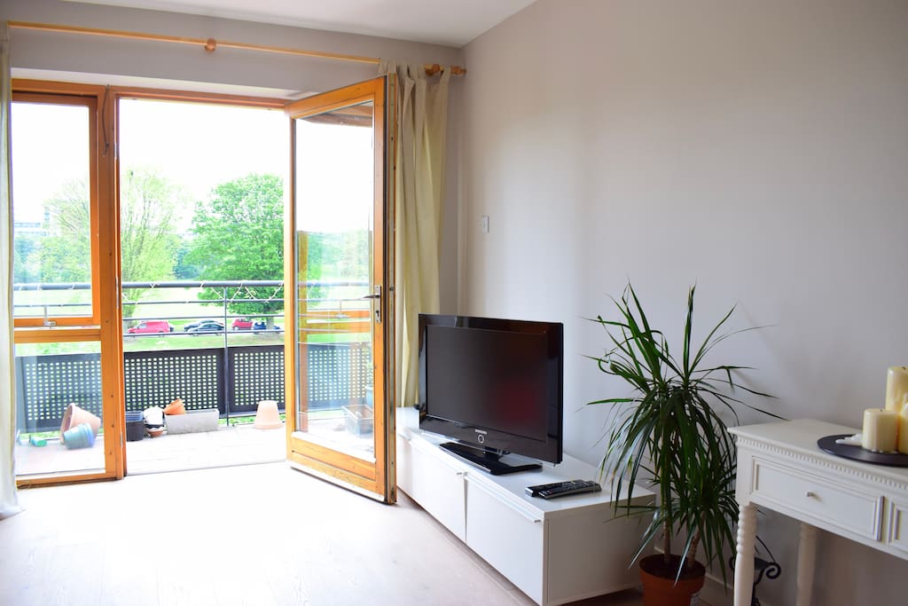 Wifi included. Television has 25+ channels including kids TV channels. There are also some foreign language channels.
