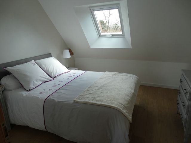 Een tweede meer intieme slaapkamer, maar de tuin is niet ver weg