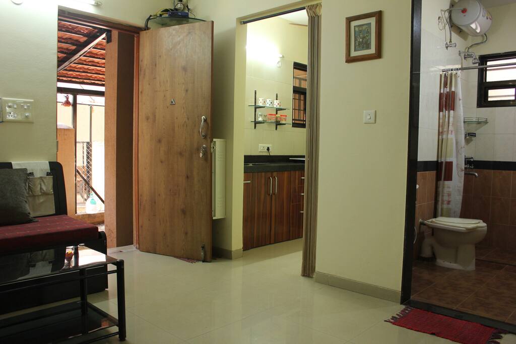 View from the TV area looking towards the Kitchen and Bath
