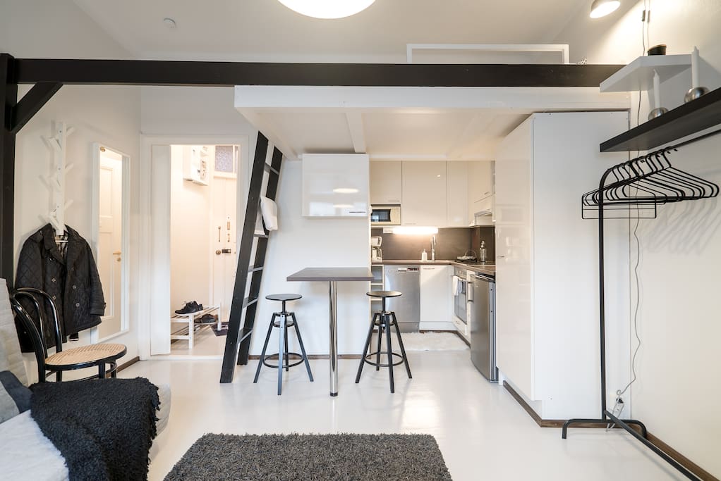 The room and the kitchen corner