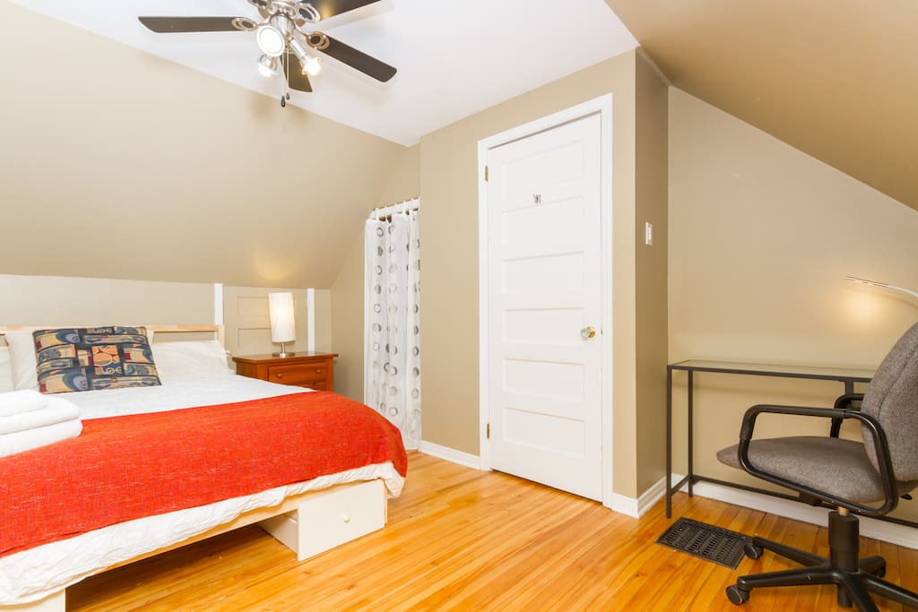 Queen bed, single closet with hangers; ironing board and iron as well as hairdryer available