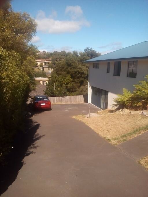 Parking and entrance at the bottom of the driveway.