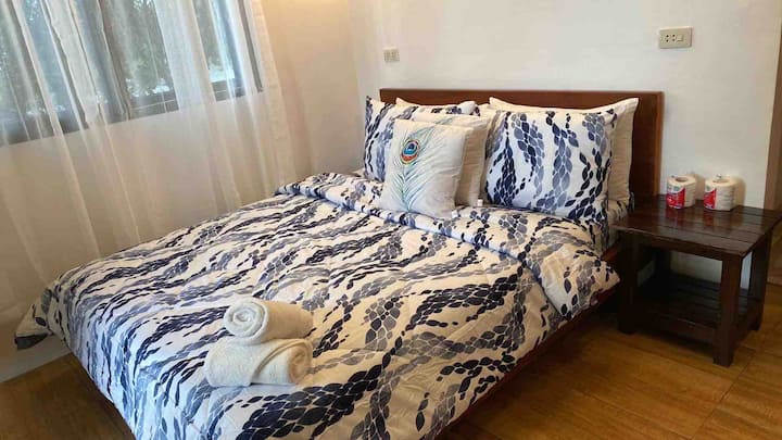 1/F Bedroom 3 has 1 queen size bed, private bathroom and balcony facing the lake view.  