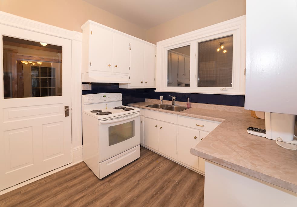 Kitchen includes microwave