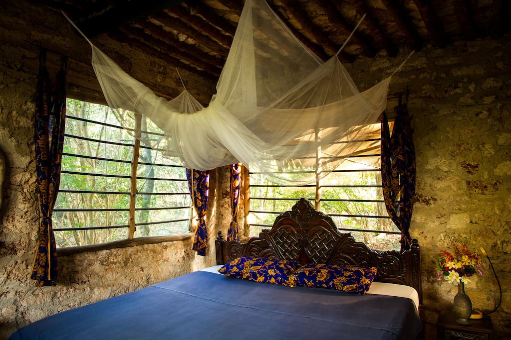 Hand Carved King Size Bed with Sea Breeze and Wild Bush Vegetation
