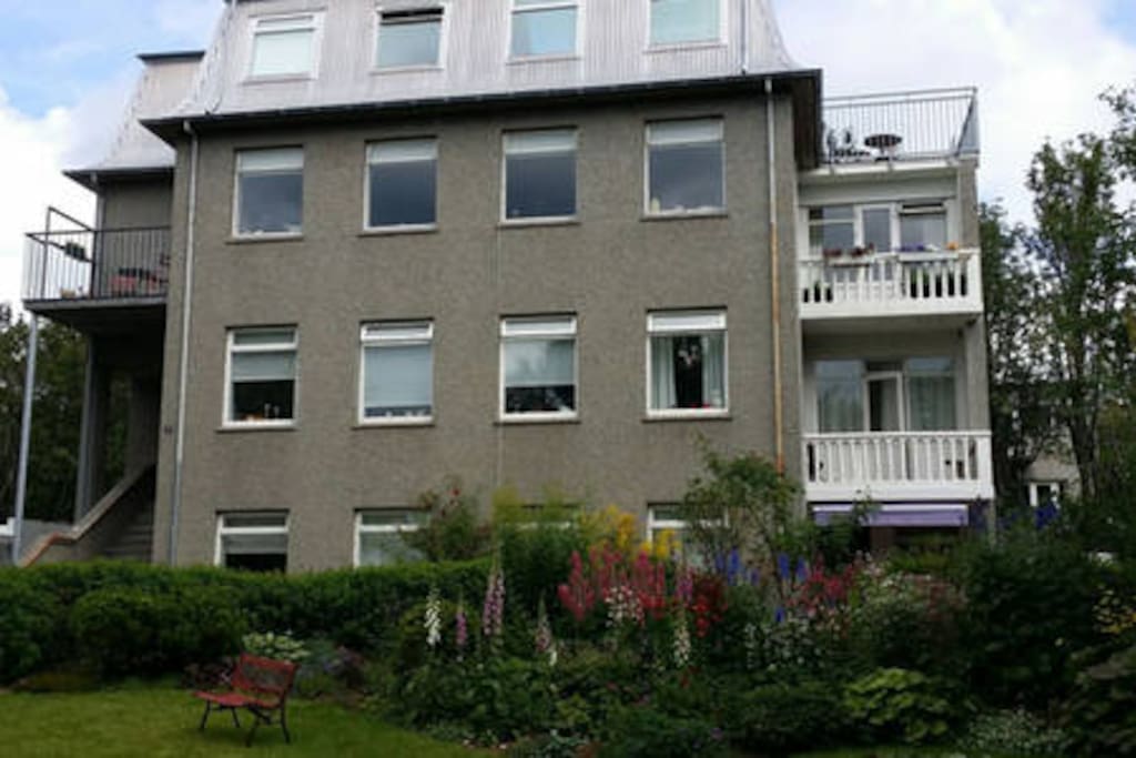The house. The apartment is on the top floor