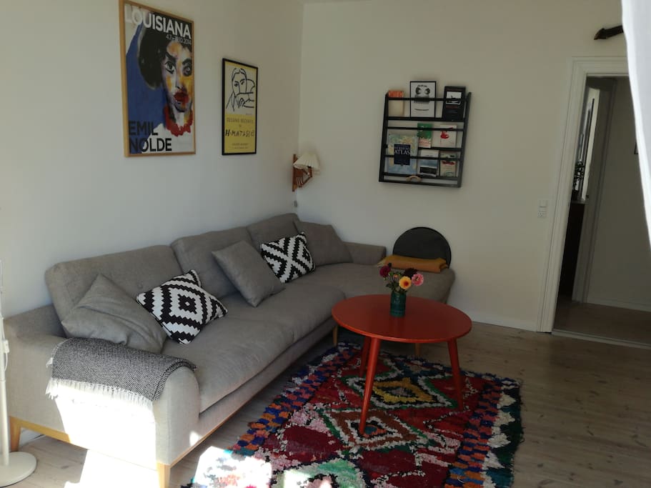 The couch is comfortable and roomy. It is possible to sleep on it. If you remove the big pillows, it is 80 cm wide.
