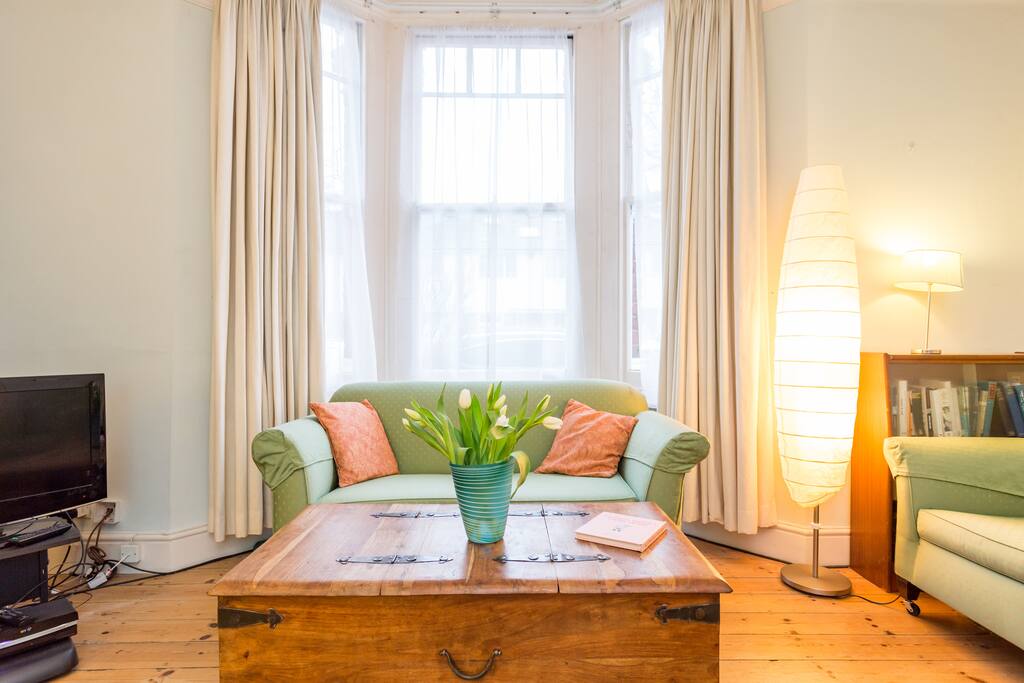 Family living room - there's a TV but we leave out a few board games for you too. Sofa bed comfortable sleeps one - two (if they're small).