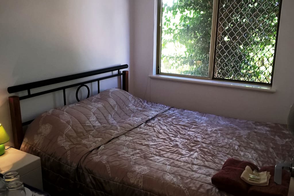 Comfortable room with queen-size bed, built in robe, desk, DVD player and WIFI
