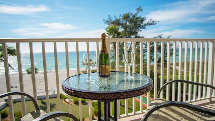 Sunset and beach view from your balcony Unit 403