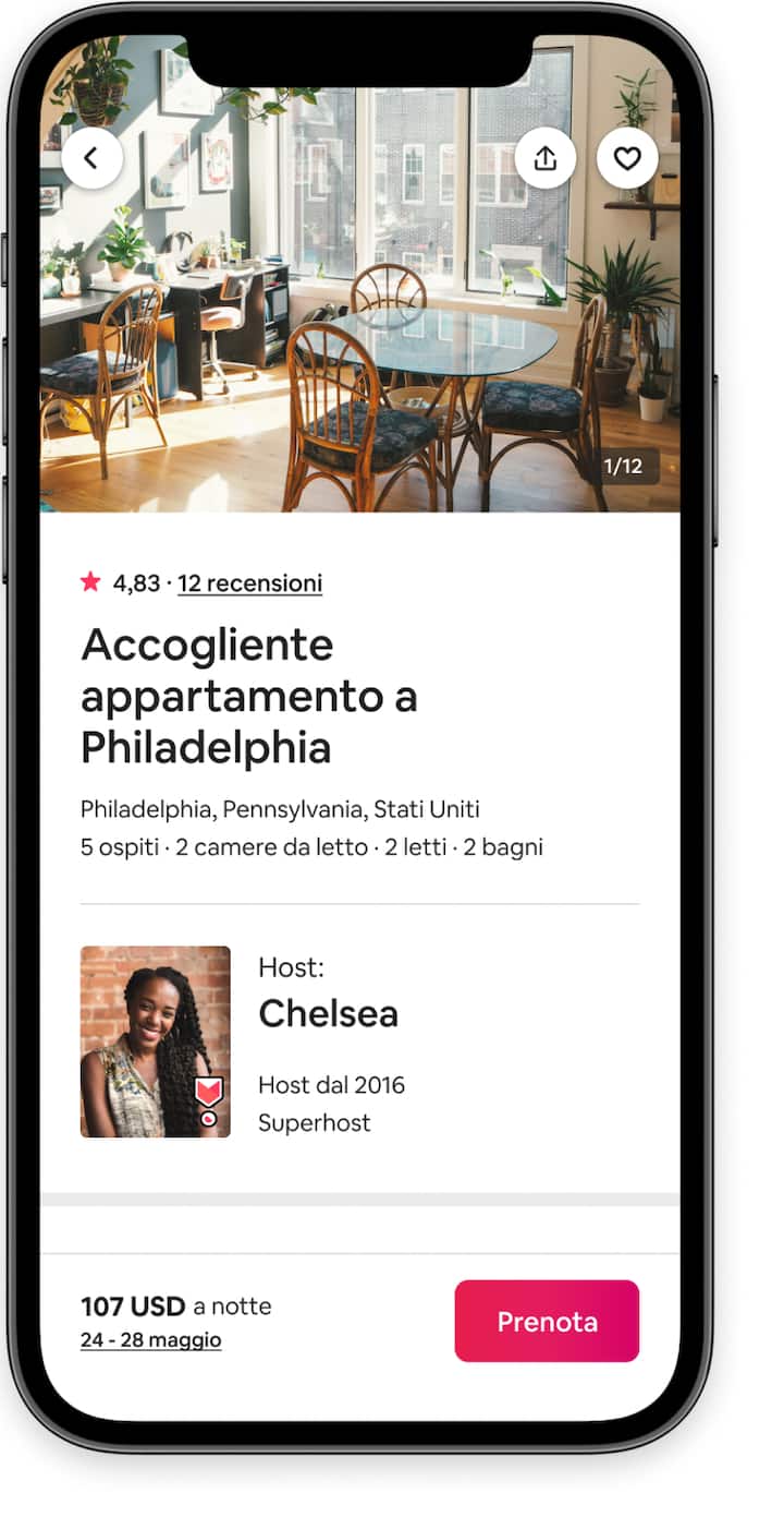 Una schermata di pagamento degli ospiti dall'app di Airbnb con la foto di una cucina, i dettagli dell'host e il pulsante "Prenota".
