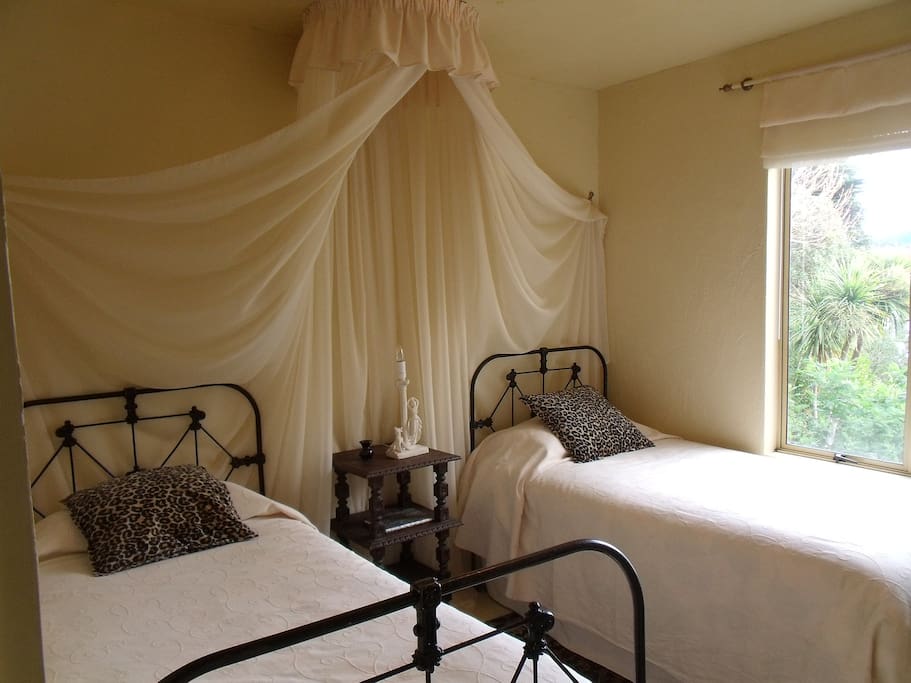 Two comfortable and warm single beds.