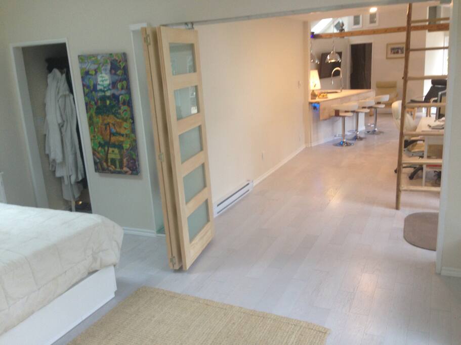 Looking from inside master bedroom towards office (bedroom doors open)
