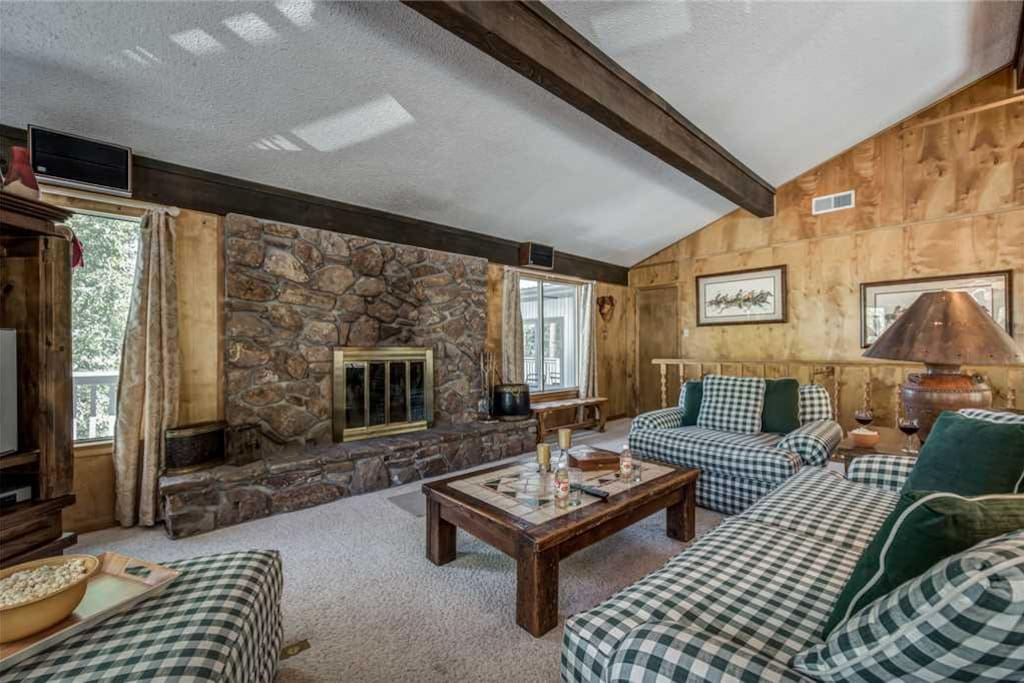 Perfect Family Accommodations - With plenty of space, the open floor plan living area has everything your family needs this vacat