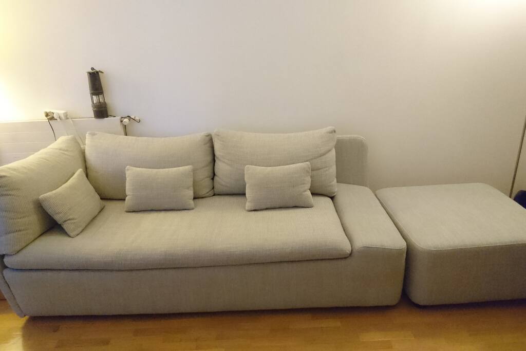 The sofa in the livingroom (where you'll sleep)