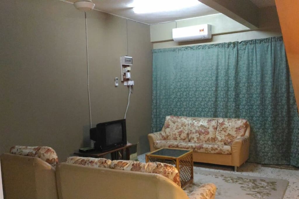 living room with sofas and tv