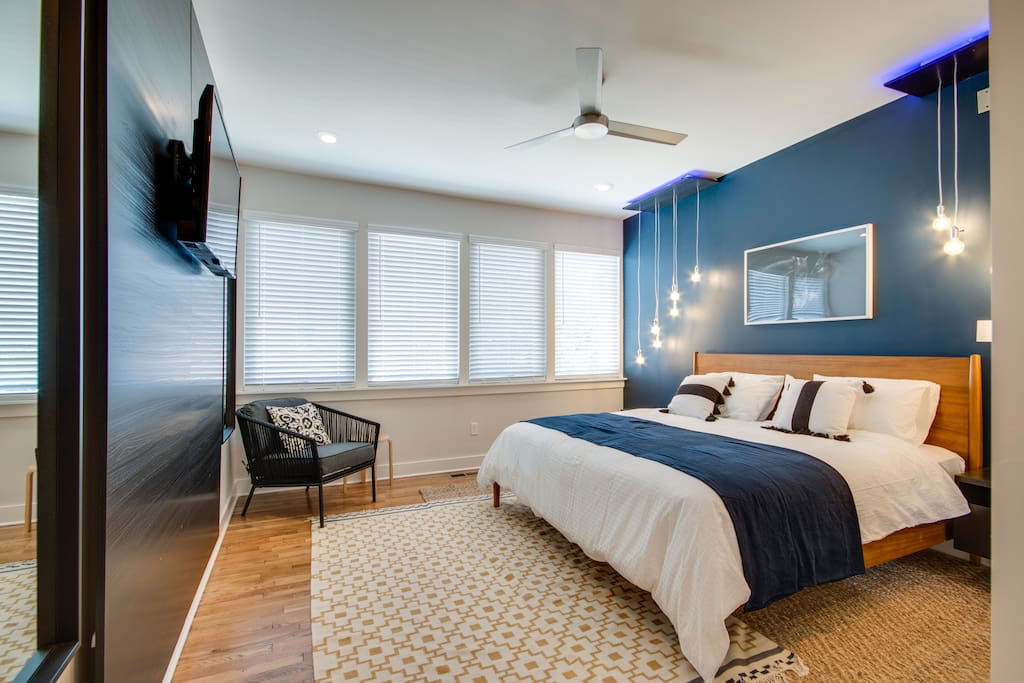 Master Suite Complete with Custom Cascade Lighting and Custom Backlight Entertainment Center (with SMART TV)