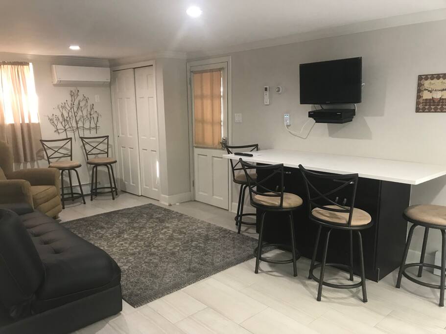 Living area with Recliner & Sofa-bed (can open flat for bed ) comfortable recliner.