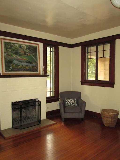 The window trip and mantel are examples of the original Craftsman style carpentry.