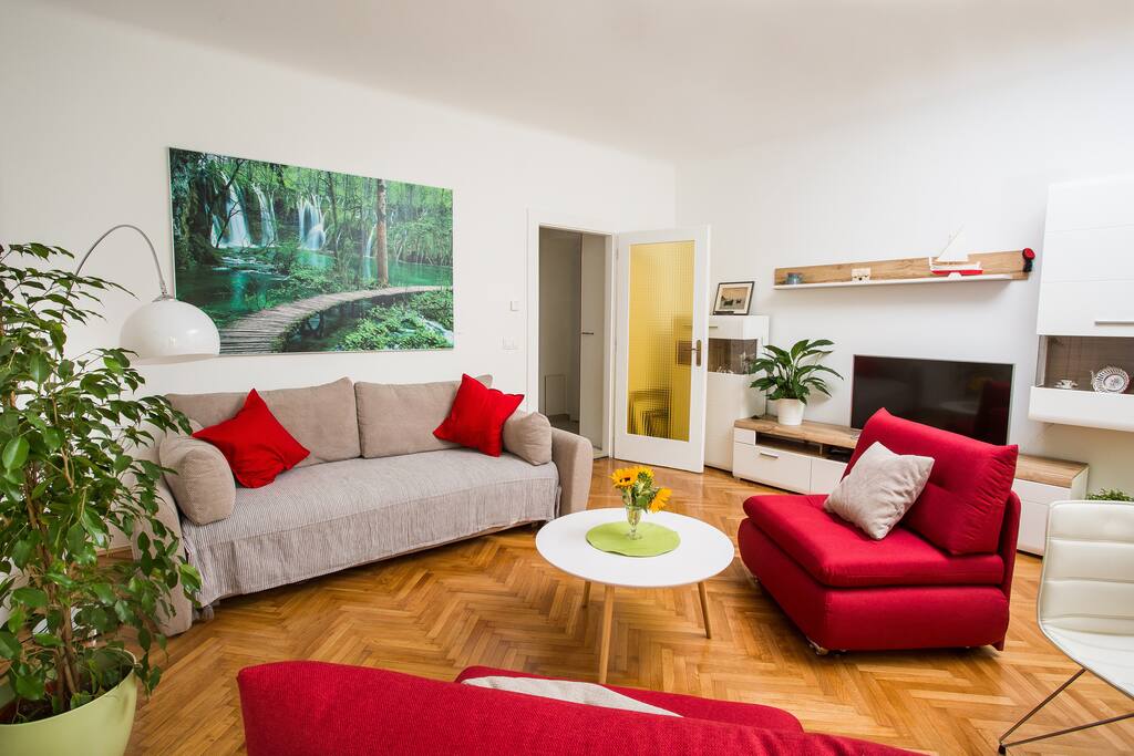 Living Room. TV. Couch. Coffee Table. Lounge Chair.