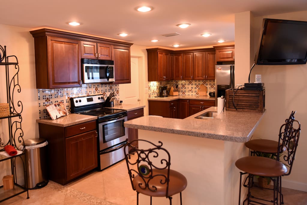 Bright and open kitchen, dining, and living space