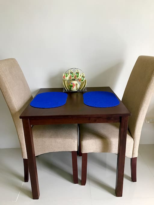 The dining area in which you may also use as a desk.