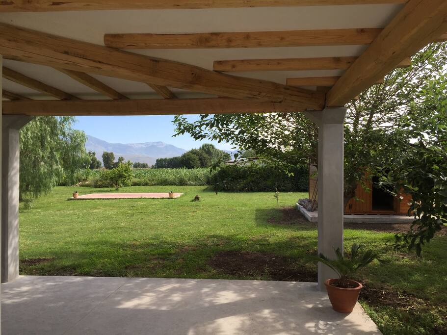 Veranda with view on the garden & mountains