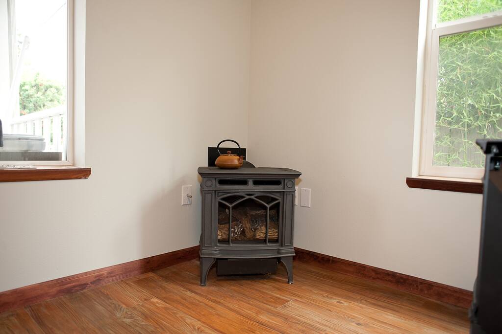 This gas stove will keep you cozy all winter long. In the summer time it's off and the house stays cool with fans and open windows.